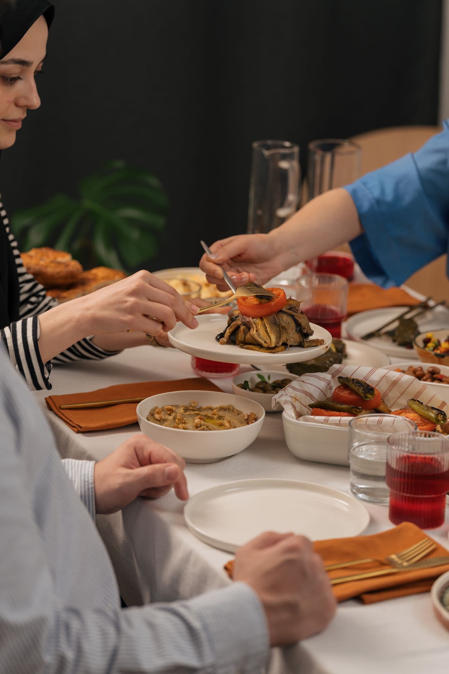 People sharing a meal together at a community gathering